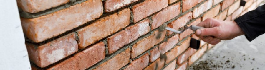 Installing bricks with traditional mortar